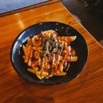 Place where you can hang out with your friends or family while enjoying good food and drinks