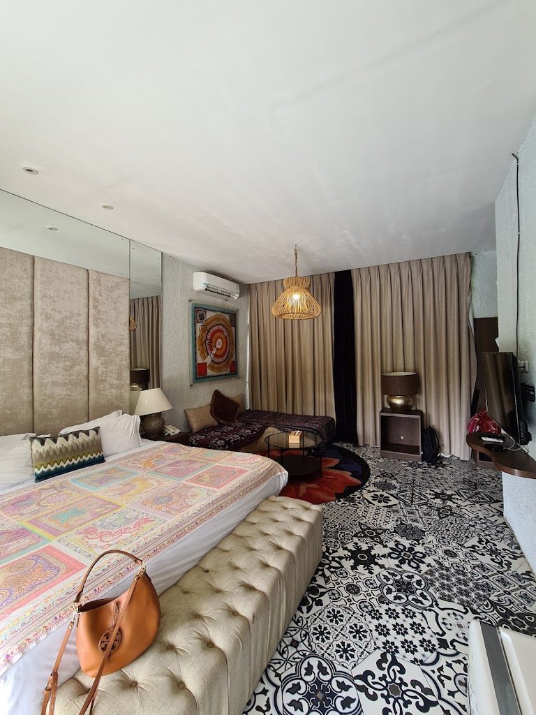 an infinity pool and cabanas.