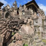 A 15th-century Hindu temple with elaborate stone carvings of serpents & mythical figures.