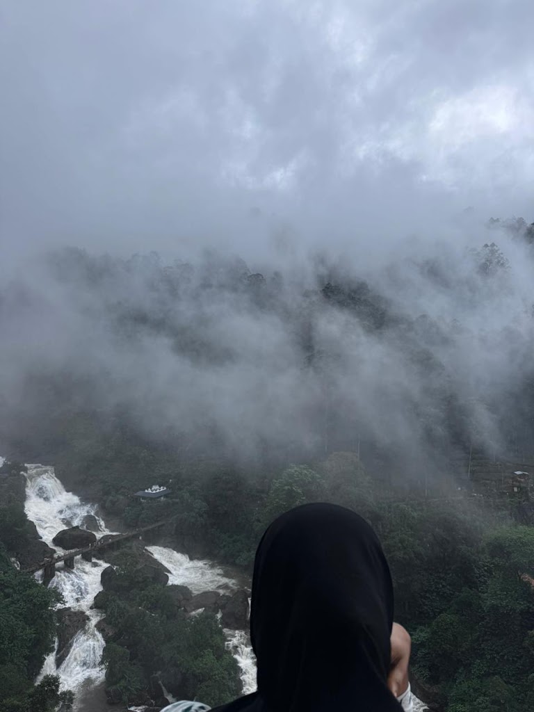 Refined rooms in a plush resort featuring an infinity pool