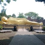 Tree-filled temple complex known for its many statues