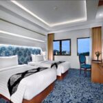 Relaxed rooms & suites in a vibrant hotel featuring a cafe