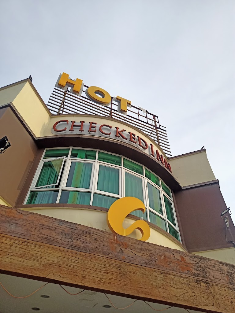 Capital O 90714 Hotel Checkedinn