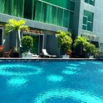 a bar & an outdoor pool.