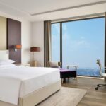 Understated quarters in a laid-back hotel featuring a restaurant