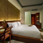 Understated rooms & suites in a laid-back hotel with an outdoor pool