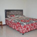 Simply furnished rooms with TVs in a down-to-earth guesthouse offering a garden.