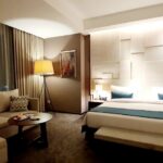 in a polished business hotel offering 4 eateries & an infinity pool.