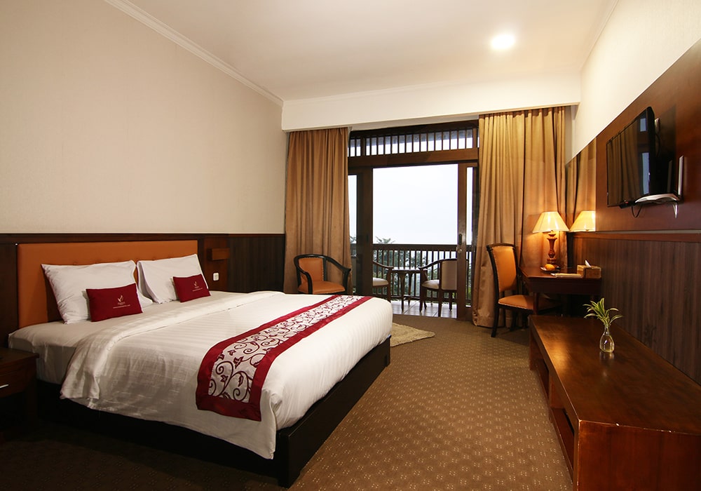 in a casual hillside hotel offering an outdoor pool & dining.