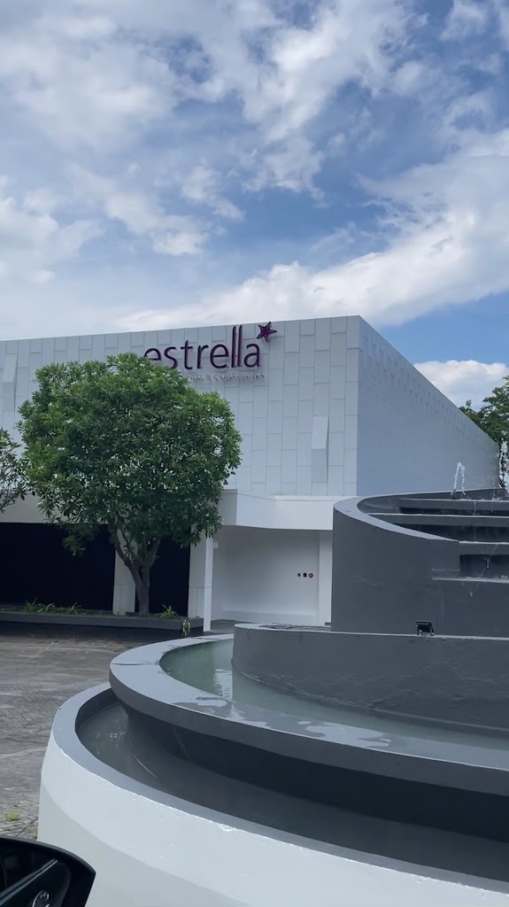 Refined hotel featuring an outdoor pool with sea views