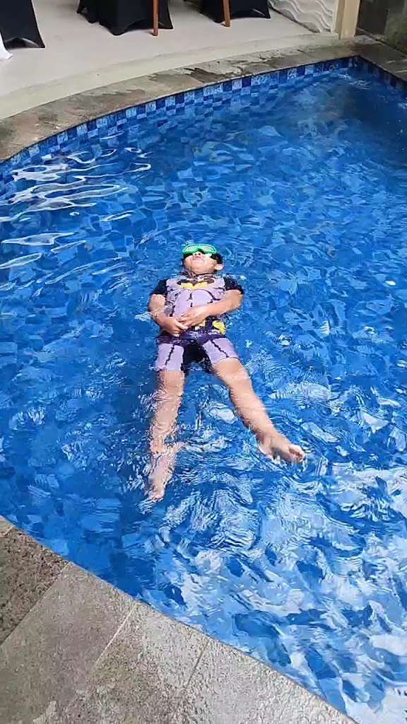 an outdoor pool & a restaurant