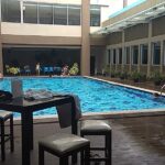 an outdoor pool & a gym.