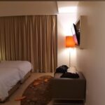 Streamlined rooms & suites in a bright hotel featuring a rooftop bar & pool