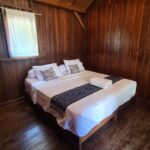 Tropical beachfront resort offering 6 overwater wood bungalows