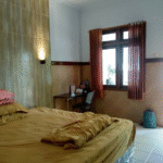 Simply furnished rooms in a low-key budget hotel featuring Wi-Fi & parking spaces.