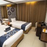 Warmly decorated rooms in a casual hotel featuring a spa