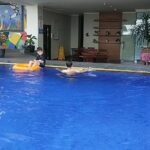 a fitness center & an outdoor pool.