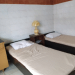 Roadside property offering no-frills rooms with TVs & minifridges