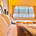 Warm rooms in an informal hotel featuring a restaurant & a cafe
