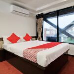 Simply furnished rooms with a/c in a straightforward budget hotel offering Wi-Fi.