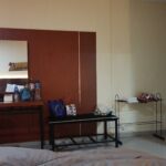 Simple roadside hotel offering rooms with a/c