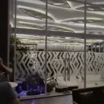 Polished hotel featuring an outdoor pool