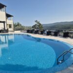 Unfussy suites with sea views in a relaxed hotel offering an understated restaurant with a terrace.