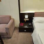 Warmly furnished rooms in a straightforward hotel featuring complimentary Internet access.