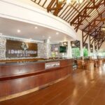 Relaxed hotel offering airy rooms & bungalows