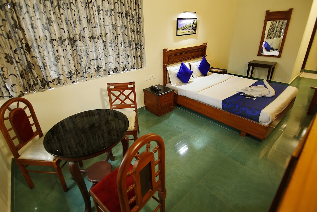 Understated rooms in a humble hotel with an international restaurant