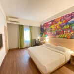 Down-to-earth rooms & suites in a relaxed hotel with an outdoor pool