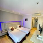 Simple rooms in an unassuming hotel offering breakfast