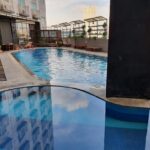 an outdoor pool & a gym.