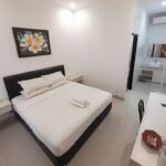 in an informal hotel featuring an outdoor pool & a terrace.