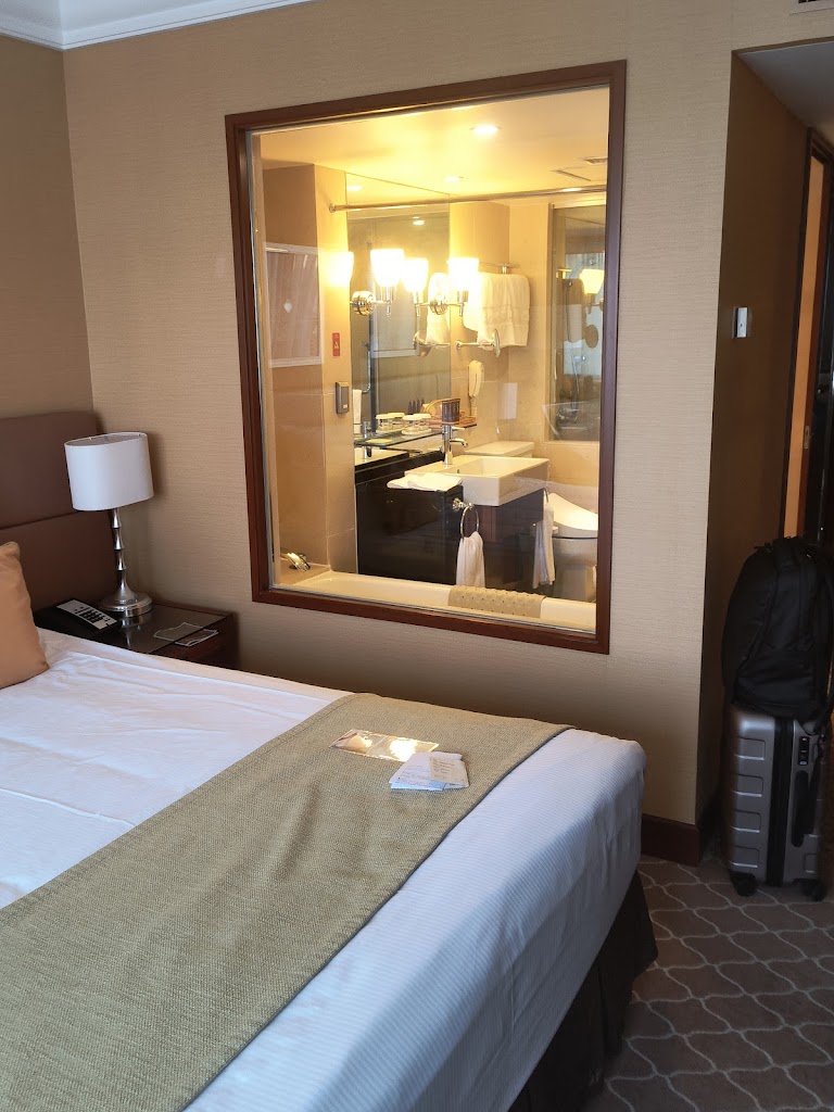 Polished rooms & suites in a storied