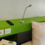 simply furnished rooms in a low-key budget hotel with free Wi-Fi & a casual 24-hour cafe.