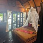 Remote high-end dive resort with a private beach & jetty