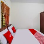 Simply furnished quarters in a straightforward guesthouse offering Wi-Fi & parking.
