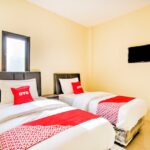 Pared-down rooms with air conditioning & TVs in a functional budget hotel offering parking.