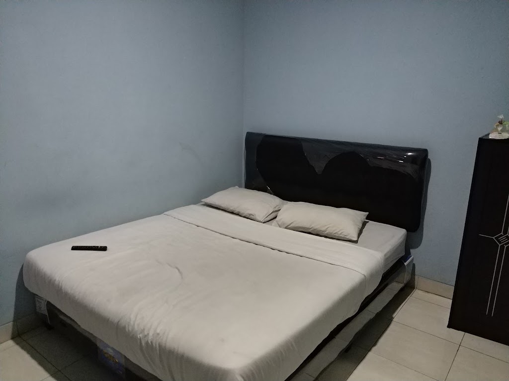 Super OYO 91535 J&b Rooms Tomang