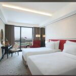 Airy rooms & suites in a contemporary hotel offering dining