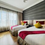 Unassuming hotel offering unpretentious rooms & suites