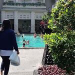 an open-air bar & an outdoor pool.