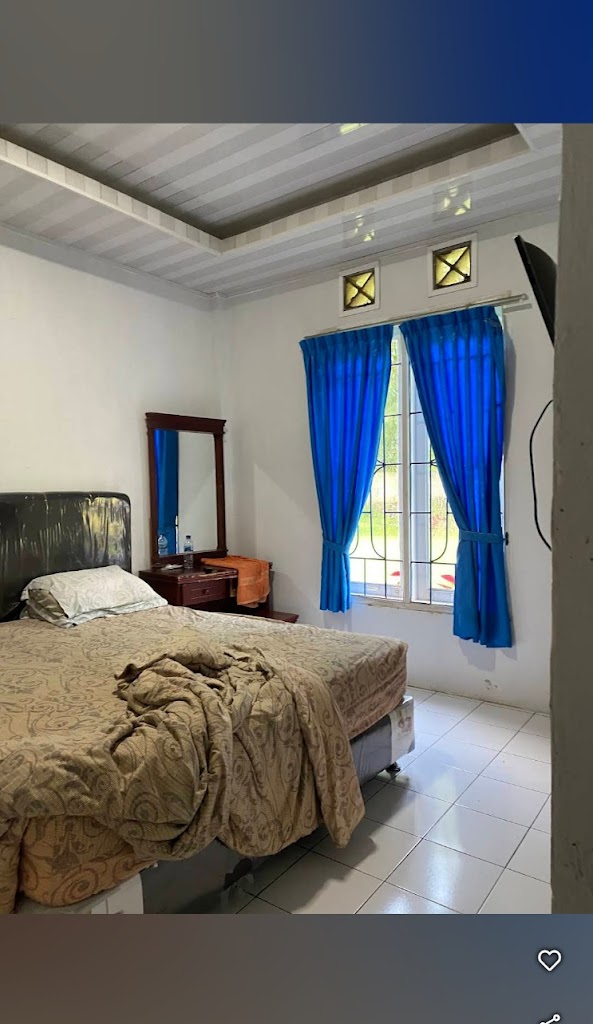 Modest rooms in a laid-back hotel offering a sitting area