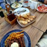 okružen parkovima u neposrednoj blizini Petrovaradinske tvrđave.