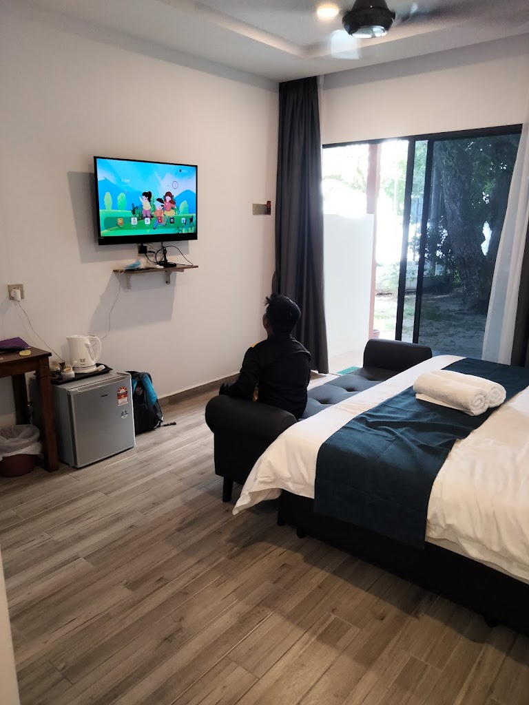 Simple rooms in an unpretentious hotel across from the beach