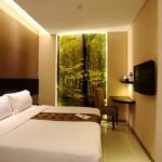 Simply furnished rooms in a casual hotel offering event space