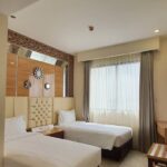Contemporary budget hotel offering pared-back rooms with colorful accents