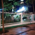 Green square with tennis courts