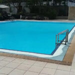 an outdoor pool & a spa.